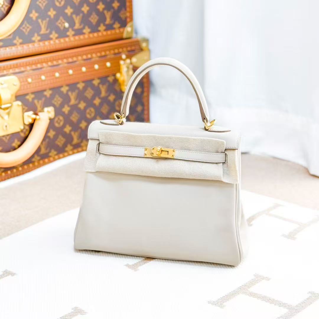 Hermes Kelly25 8L Glacier White with Platinum Buckle Swift Leather