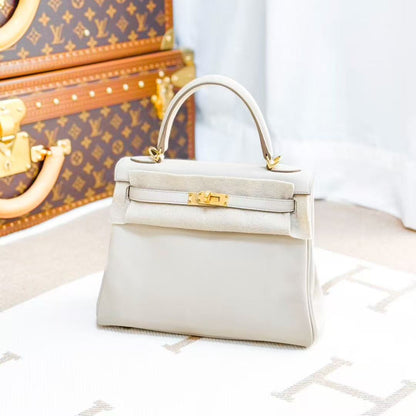Hermes Kelly25 8L Glacier White with Platinum Buckle Swift Leather