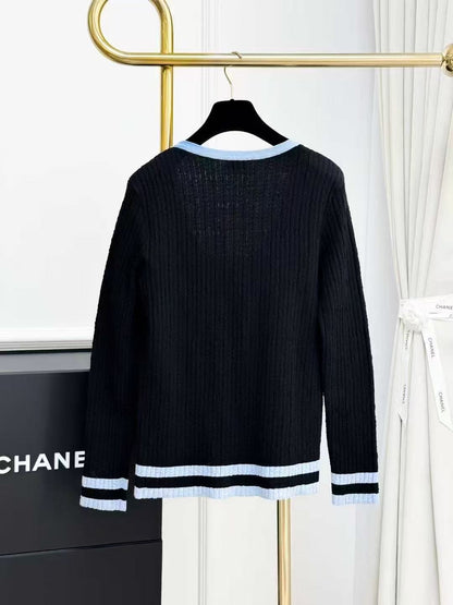 Chanel 24B Black Knitted Top with Blue Trim, Large Neckline and Long Sleeves