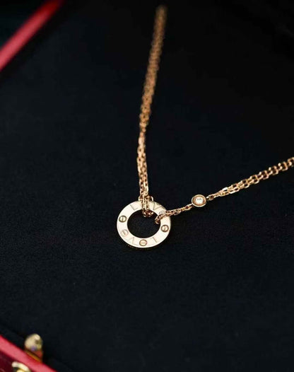 Cartier Love Collection 18k Rose Gold Round Pendant Necklace with Two Diamonds