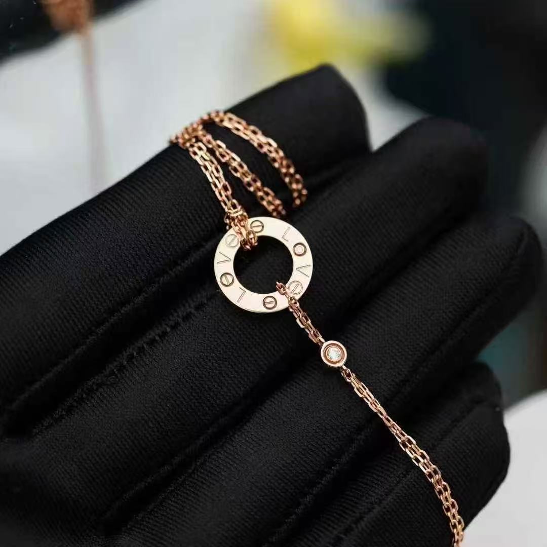 Cartier Love Collection 18k Rose Gold Round Pendant Necklace with Two Diamonds