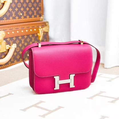 Hermes Constance 24 E5 Peach Pink with Silver Buckle