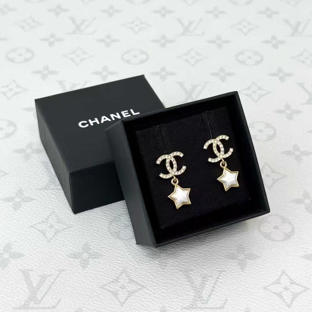 Chanel 24C Pearl White Star Gold Double C Stud Earrings