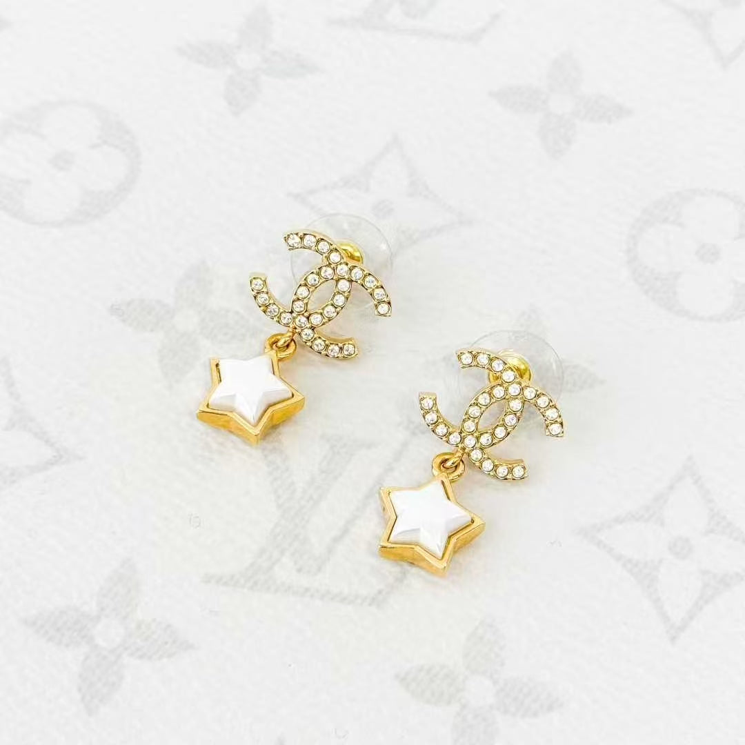 Chanel 24C Pearl White Star Gold Double C Stud Earrings