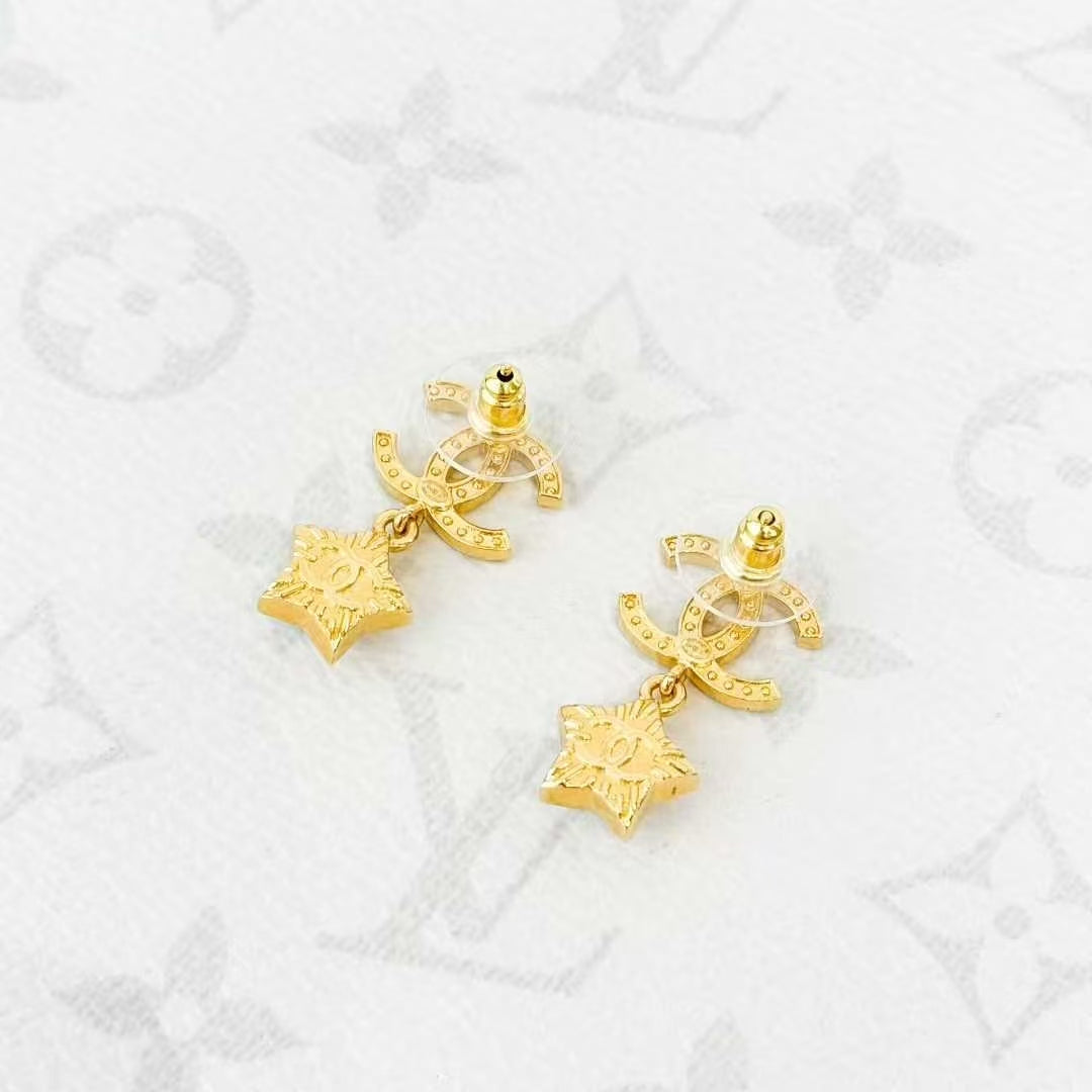 Chanel 24C Pearl White Star Gold Double C Stud Earrings