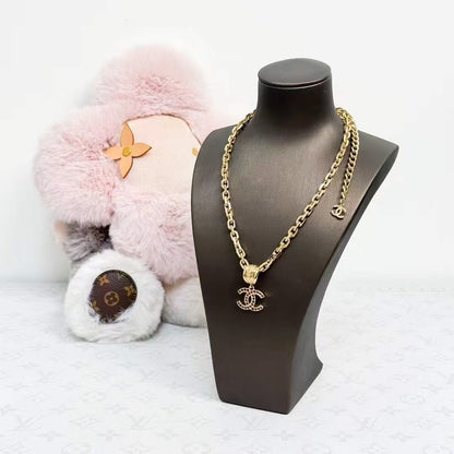 Chanel 25A Red Diamond-Studded Gold Double C Pendant Necklace
