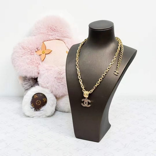 Chanel 25A Red Diamond-Studded Gold Double C Pendant Necklace