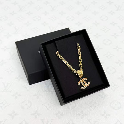 Chanel 25A Red Diamond-Studded Gold Double C Pendant Necklace