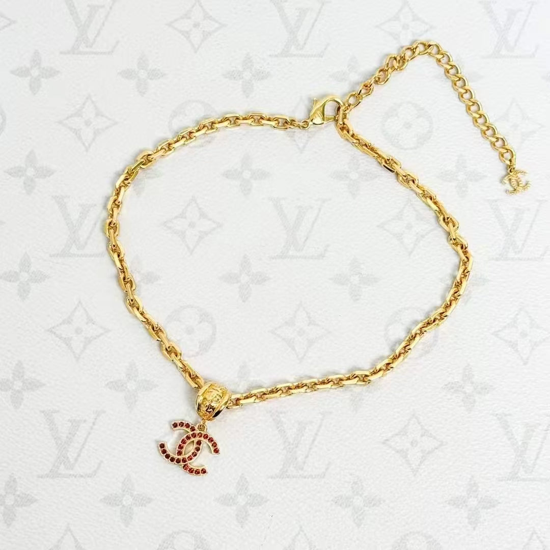 Chanel 25A Red Diamond-Studded Gold Double C Pendant Necklace