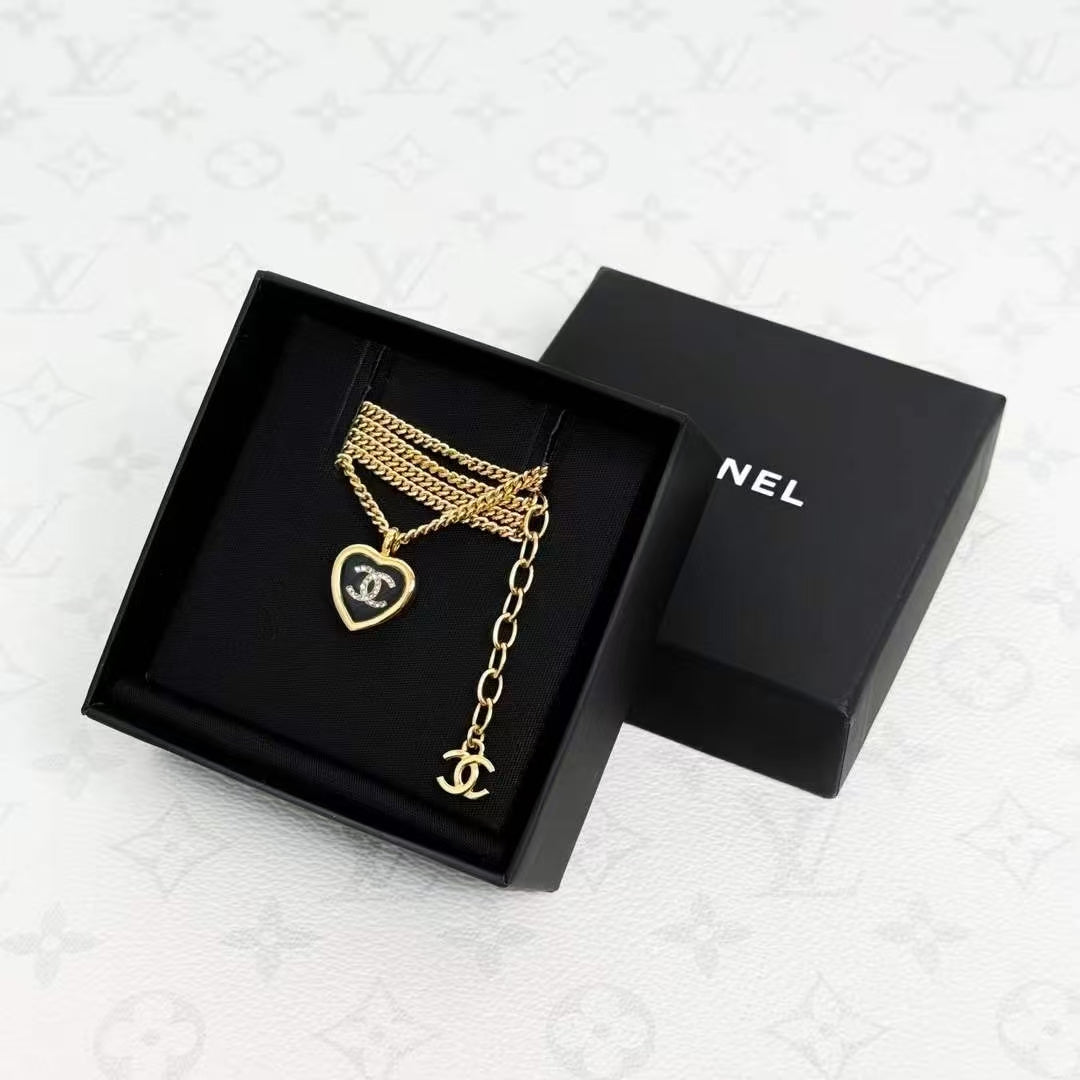 Chanel 25B Black and Gold Heart Enamel Pendant Necklace