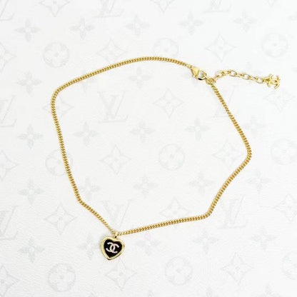 Chanel 25B Black and Gold Heart Enamel Pendant Necklace