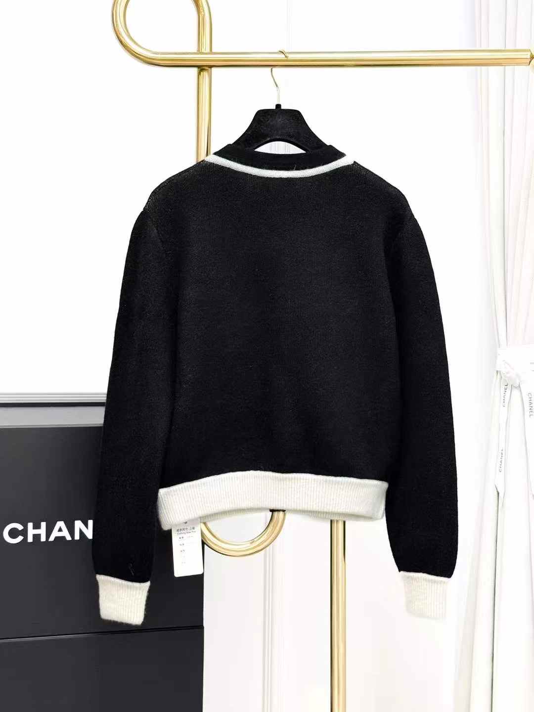 Chanel 21B Fall/Winter Preview: Black Cream Knit Jacket with White Trim