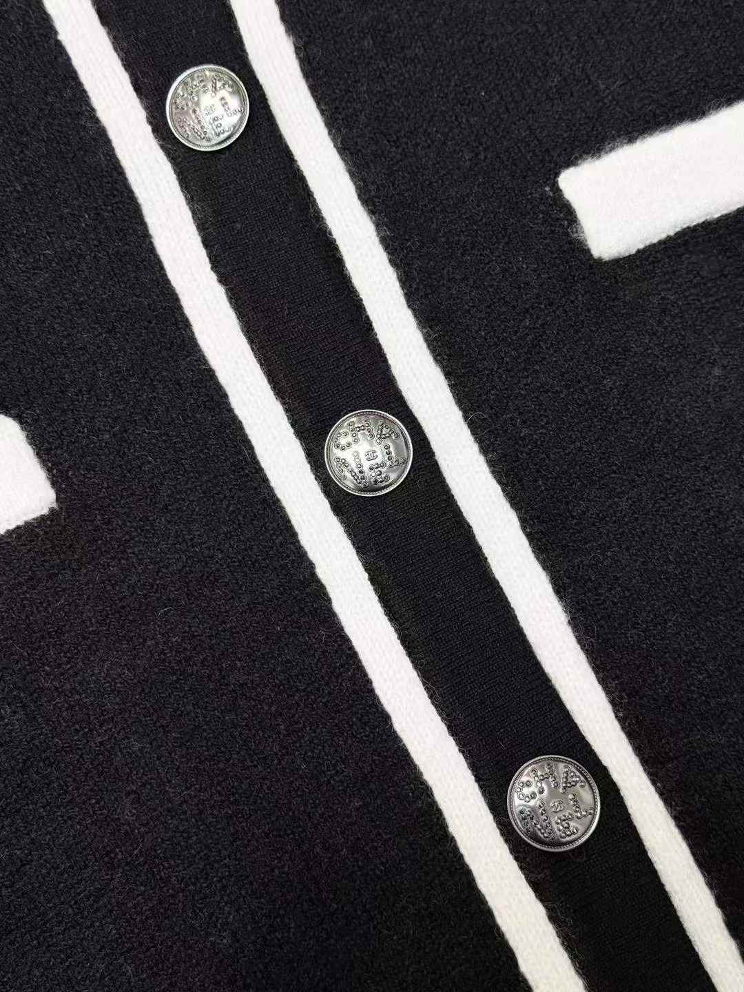 Chanel 21B Fall/Winter Preview: Black Cream Knit Jacket with White Trim